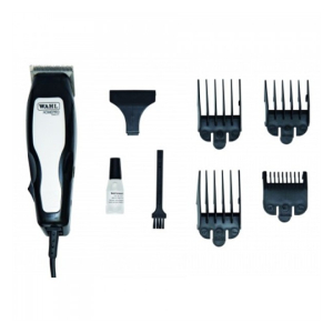 09155-1116 - Computech-Solutions Wahl hair trimmer with multiple guide combs and grooming accessories laid out for home use