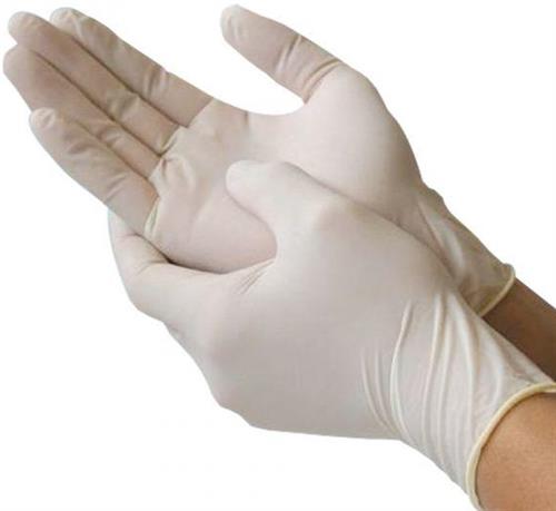 201785475004 - Computech-Solutions Person putting on a disposable latex glove; an ungloved hand is helping slip the glove over the other hand.