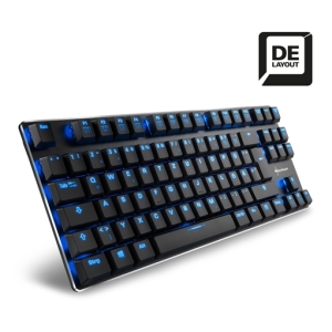 Compact angled mechanical keyboard with blue backlight, black keys, chrome frame, and a DE layout badge in the corner.