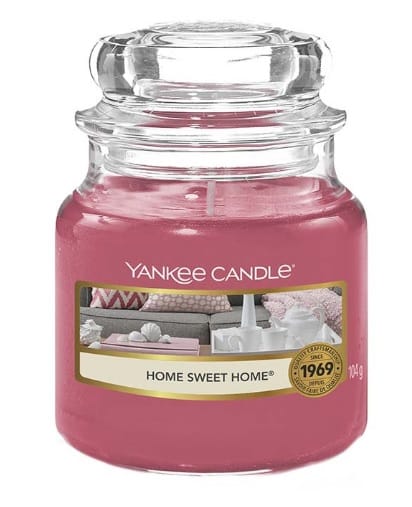 5038580062021 - Computech-Solutions Pink Yankee Candle jar candle labeled 'Home Sweet Home' in a clear glass jar with gold-trimmed label and a 1969 seal visible on the front.