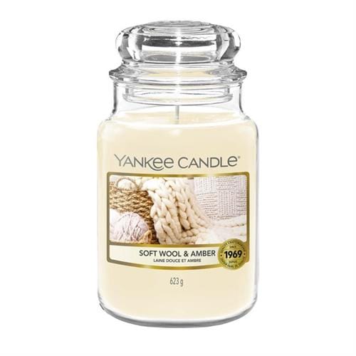 5038581147703 - Computech-Solutions Yankee Candle jar with cream wax in a clear glass container; label reads 'Soft Wool & Amber' with a gold badge