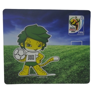 Cartoon lion mascot in green shorts holding a soccer ball on a grassy field with the 2010 FIFA World Cup South Africa logo in the background.