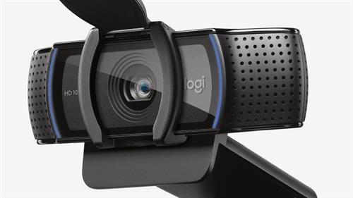 960-001252 - Computech-Solutions Logitech HD webcam with flip-up lens cover mounted on a stand, ready for video calls.