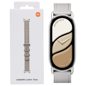 White Xiaomi product box labeled 'Leather Strap' beside a silver smartwatch with a beige/bronze dial and light gray leather strap nearby.