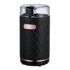 Close-up of a compact black quilted portable diffuser with a clear top and copper brand plate.