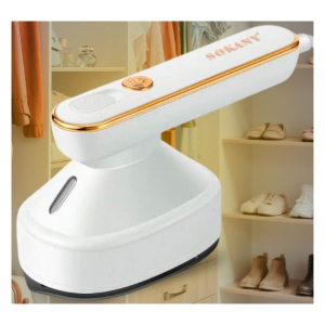 White handheld garment steamer with gold trim, set on a stand in a closet with hanging clothes and shoes, ready to remove wrinkles.