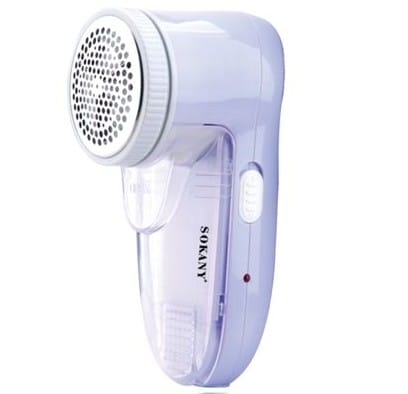 CSYSK883BLU ComputechSolutions Handheld fabric shaver with a round perforated head and transparent lint reservoir for removing pills from clothing (purple device).