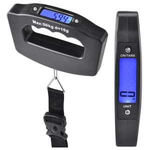 Digital luggage scale with blue backlit display reading 5.94 kg and a hanging strap with buckle.