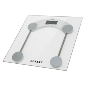 Digital glass bathroom scale with a digital display and four round foot pads, brand Sokany visible on the surface.