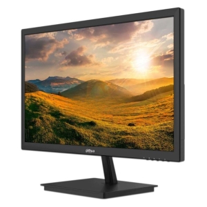 Black computer monitor on a stand displaying a sunset landscape over rolling hills.