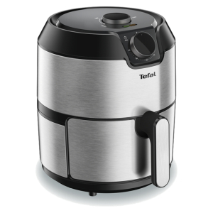 Tefal air fryer with brushed stainless steel body, black top, and front handle on a kitchen counter