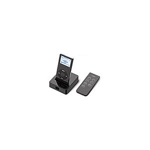 Small black electronic device with a top LCD screen and a circular control dial, shown with a separate remote control nearby.