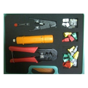 Electrical toolkit in a foam tray: crimping pliers, wire stripper, small cutting/terminating tools, and assorted terminal connectors ready for wiring work.