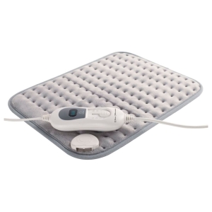 White electric heating pad with a user control unit, power cord, and a detachable plug on a gray quilted mat.
