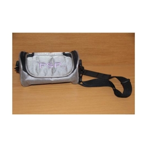 Small silver shoulder bag with a purple PSP logo and black adjustable strap on a wooden surface.