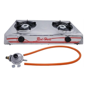 Two-burner portable gas stove with a chrome body and Red Hot branding, connected to an orange propane hose and regulator.
