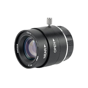 Close-up of a black camera lens with focus/adjustment rings and 'NEAR'/'OPEN' markings