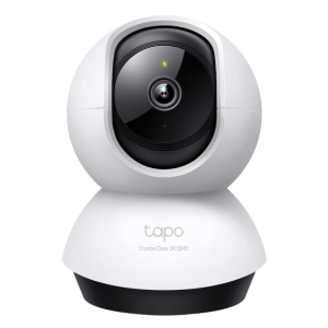 White spherical home security camera with black lens, mounted on a rounded base (Tapo Crystal Clear 2K QHD).