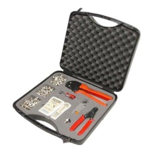 Open hard-shell tool kit with red-handled pliers, crimpers, rivets, and fasteners