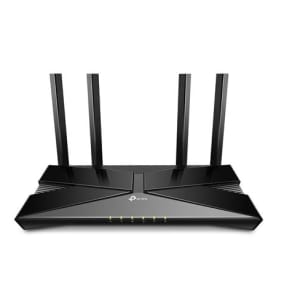 Black wireless router with four external antennas and LED indicators on the front panel.