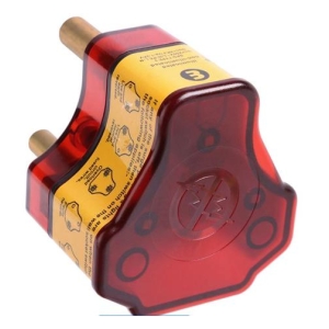 Red translucent rotary control component with two gold pins and a yellow label wrapped around it, shown at an angle against a white background.