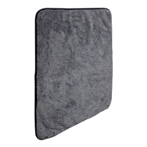 Gray bath towel folded with a rounded bottom-right corner, showing soft terry texture in close-up it’s a textile item.