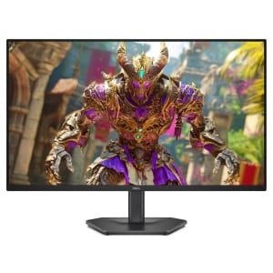 Dell monitor on a stand displaying a fantasy game scene featuring a gold and purple armored demon-like character in a vibrant town setting