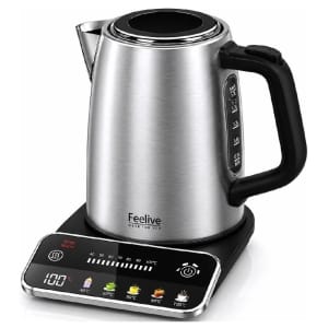Stainless steel electric kettle on a black base with a digital control panel showing temperature and keep-warm icons.