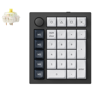 Q0M-M4_Keychron-Q0-Max-QMK-Gateron-Jupiter-Banana-RGB-Wireless-Custom-Number-Pad-Carbon-Black_wr_01ajpg - Computech-Solutions Close-up of a black programmable keypad with white number keys and a row of dark M1–M5 function keys on the left; a small yellow switch module sits to the left.