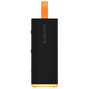 Close-up of a black JBL portable Bluetooth speaker with orange top and bottom accents, standing upright.