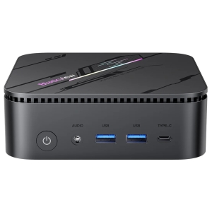 Compact black mini PC with vented top, front power button, audio jack, two USB 3.0 ports, and a USB-C port labeled on the front panel.
