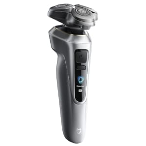 Electric shaver with dual rotary heads and a metallic gray body, featuring a vertical display on the handle.