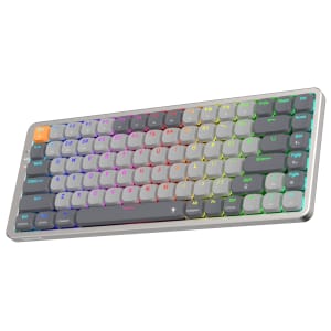 RDK652GGRGBPRORedragonAZUREWirelessMechanicalGamingKeyboardwr01ajpg ComputechSolutions Rainbow-lit wireless keyboard with gray keys, shown at an angled perspective on a white background, highlighting colorful backlighting.