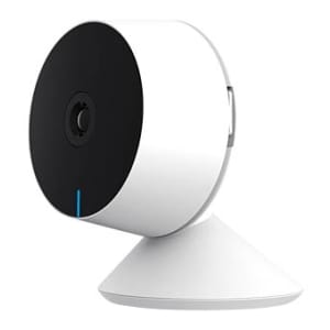 Security camera with a black circular front on a white housing, mounted on a white pedestal base.