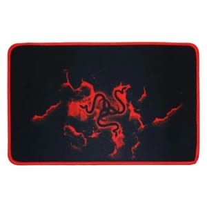 Black gaming mouse pad with red edge stitching and a glowing red Razer logo centered on the surface.