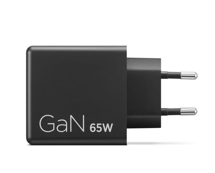 40AW065BEUdefaultjpg ComputechSolutions Compact black GaN 65W wall charger with a European two-pin plug blades.