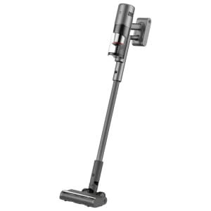 BHR09C1EUXiaomiMijiaVacuumCleaner4Prowr01png ComputechSolutions Gray cordless stick vacuum with a transparent dust canister and detachable wand, mounted on a wall bracket against a white background.